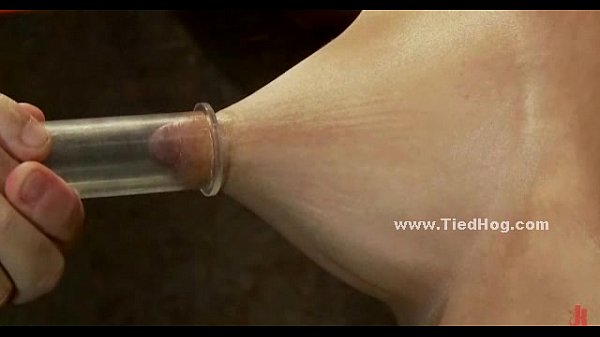 Bitch with gigantic nips strapped on wall