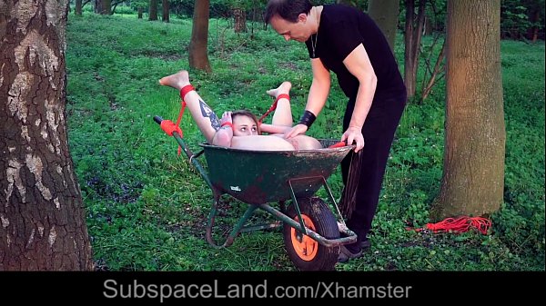 Youthful sub get tied up and fucked in the garden