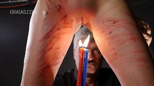 Red-haired with cane and candle have fun